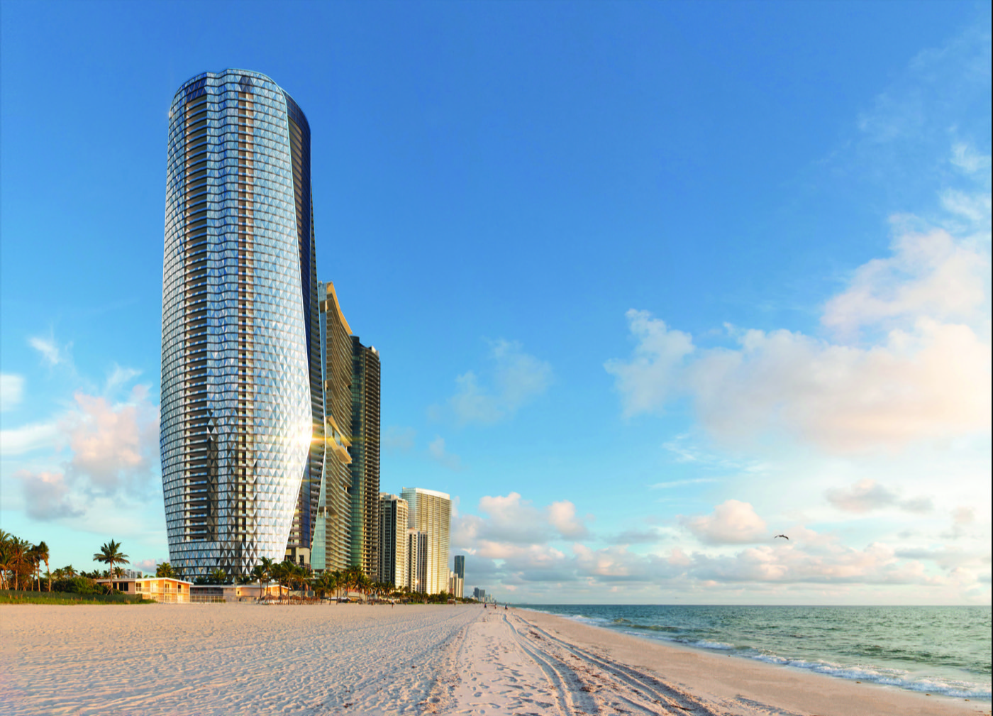 Bentley Residences Miami — reflective oceanfront exterior at sunset.